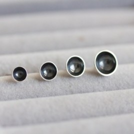 Black cup stud earrings
