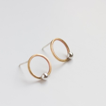 Modern circle stud earrings made of brass and silver