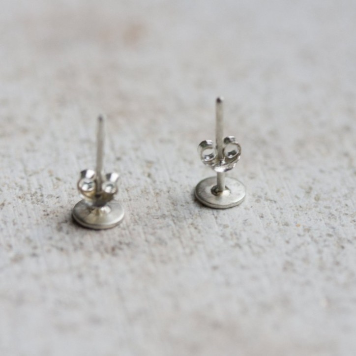Sterling silver stud earrings with stamped hearts