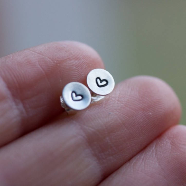 Sterling silver stud earrings with stamped hearts