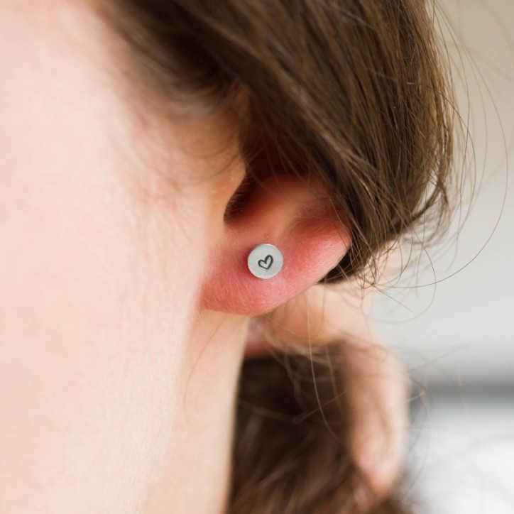 Sterling silver stud earrings with stamped hearts