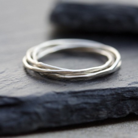 Interlocking ring made of 4 tiny bands, sterling silver or gold