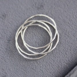 Interlocking ring made of 4 tiny bands, sterling silver or gold
