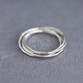 Interlocking ring made of 4 tiny bands, sterling silver or gold