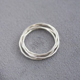 Interlocking ring made of 4 tiny bands, sterling silver or gold