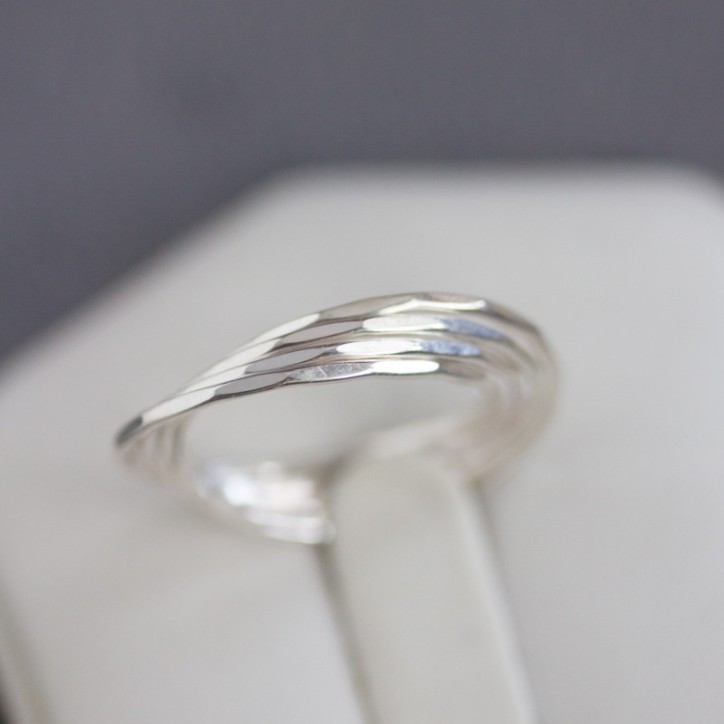 Interlocking ring made of 4 tiny bands, sterling silver or gold