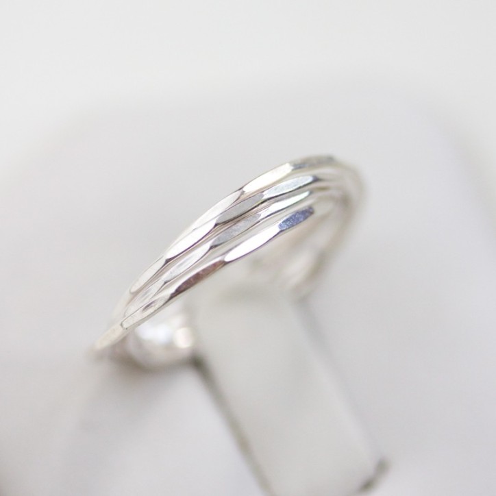 Interlocking ring made of 4 tiny bands, sterling silver or gold