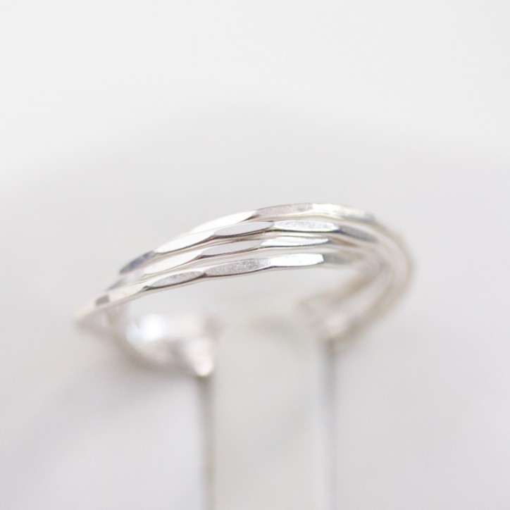 Interlocking ring made of 4 tiny bands, sterling silver or gold