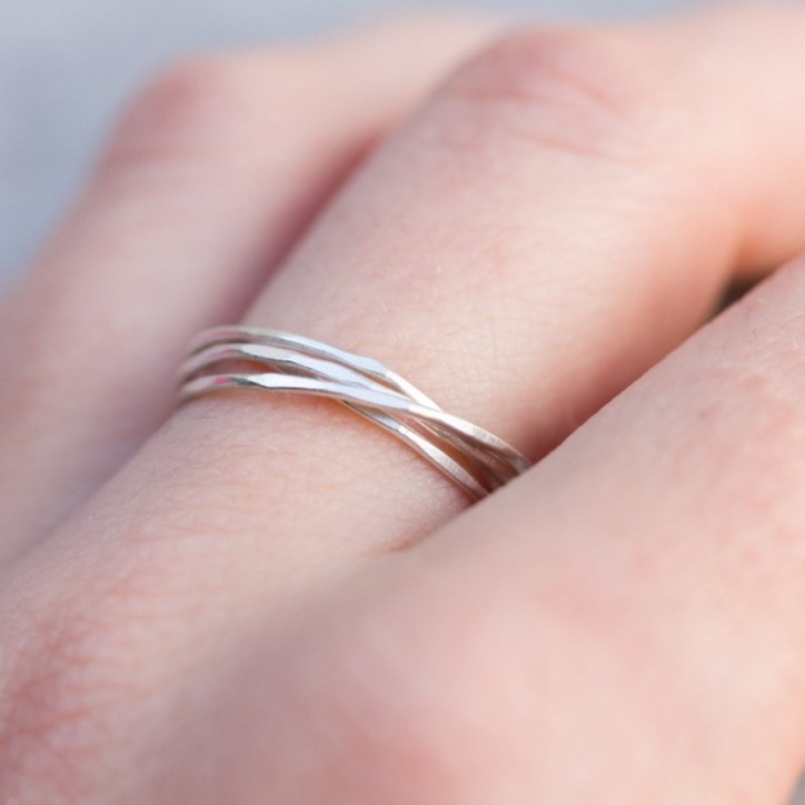 Interlocking ring made of 4 tiny bands, sterling silver or gold