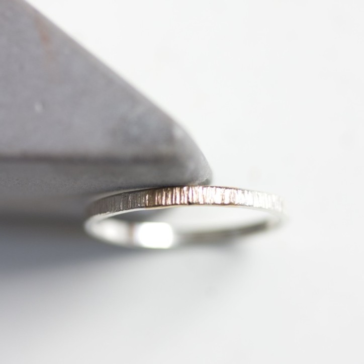 White and gold texture - sterling silver stackable ring with a gold section White and gold texture - sterling silver stackable ring with a gold section