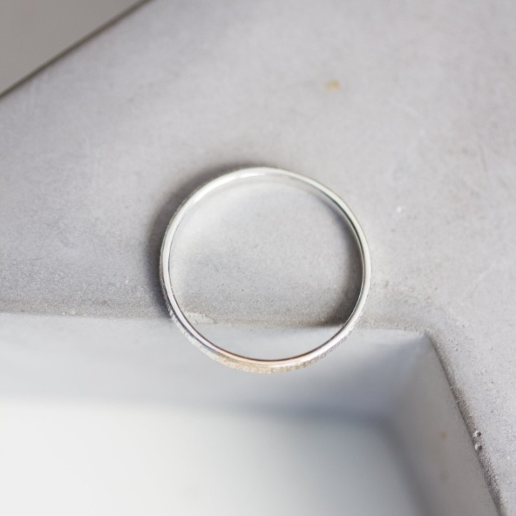 White and gold texture - sterling silver stackable ring with a gold section White and gold texture - sterling silver stackable ring with a gold section
