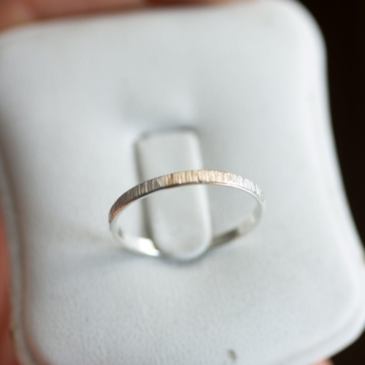 White and gold texture - sterling silver stackable ring with a gold section White and gold texture - sterling silver stackable ring with a gold section