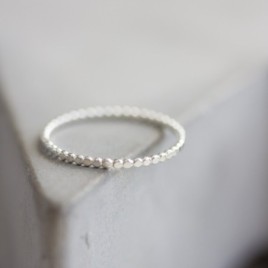 Flattened beaded ring