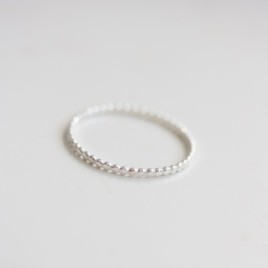Flattened beaded ring