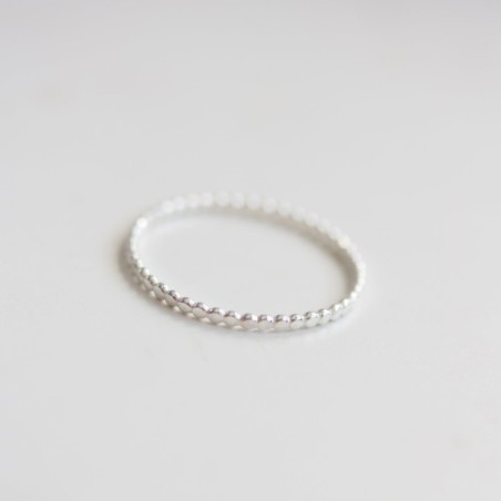 Flattened beaded ring