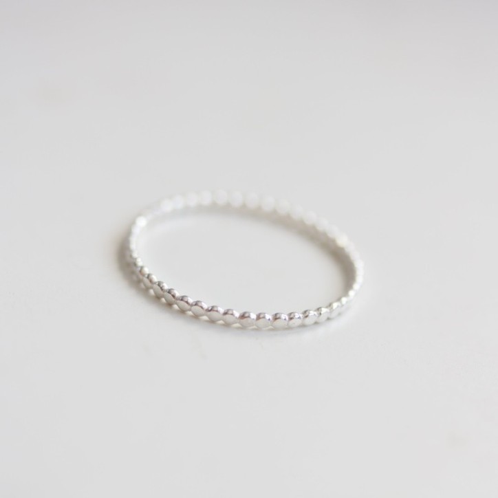 Flattened beaded ring Flattened beaded ring