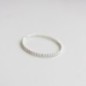 Flattened beaded ring