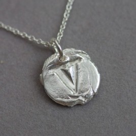 Initial necklace with a typewriter font initial, fine silver, uppercase