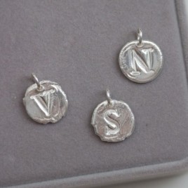 Initial necklace with a typewriter font initial, fine silver, uppercase