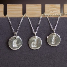 Initial necklace with a typewriter font initial, fine silver, lowercase