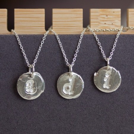 Initial necklace with a typewriter font initial, fine silver, lowercase