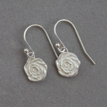 Nature inspired dangle earrings with silver roses