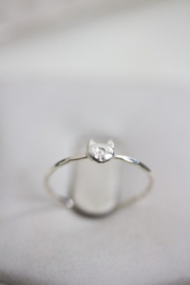 Initial ring with hand stamping in a cat head shape