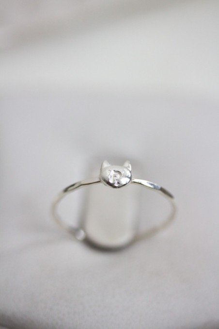Initial ring with hand stamping in a cat head shape