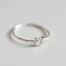 Initial ring with hand stamping in a cat head shape