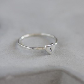 Initial ring with hand stamping in a heart