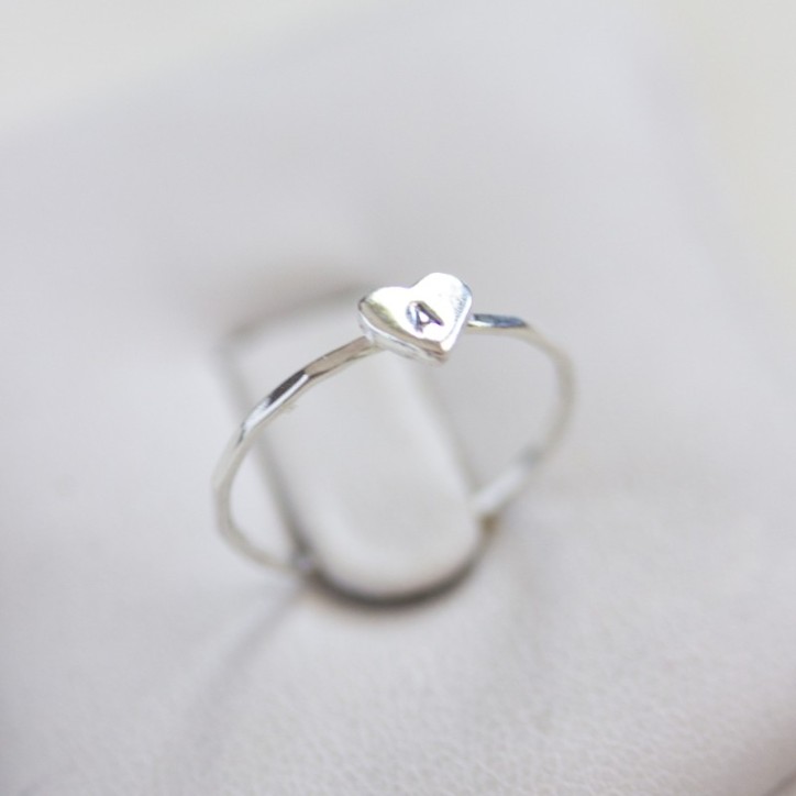 Initial ring with hand stamping in a heart