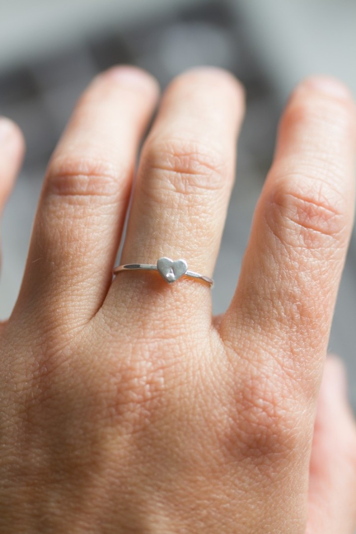 Initial ring with hand stamping in a heart