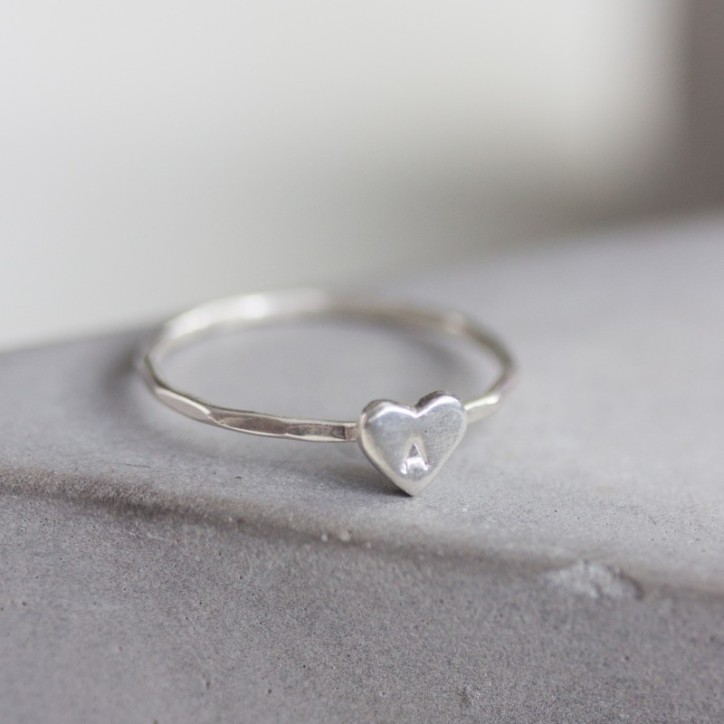 Initial ring with hand stamping in a heart