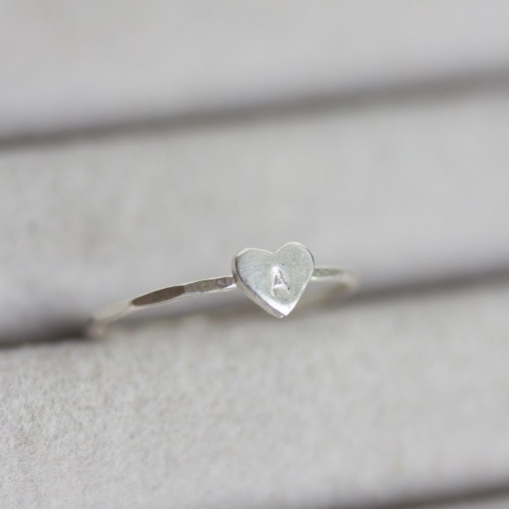 Initial ring with hand stamping in a heart